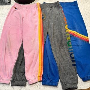 Three pairs of PLAY condition Aviator Nation sweatpants